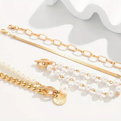 Chic Gold 4-Piece Bracelet Set – Snake, Pearls & Links | Gold by Rose & Oliver - product image 2
