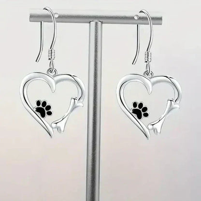 Yaritza™ – Silver Paw & Heart Drop Earrings by Rose & Oliver - product image 1